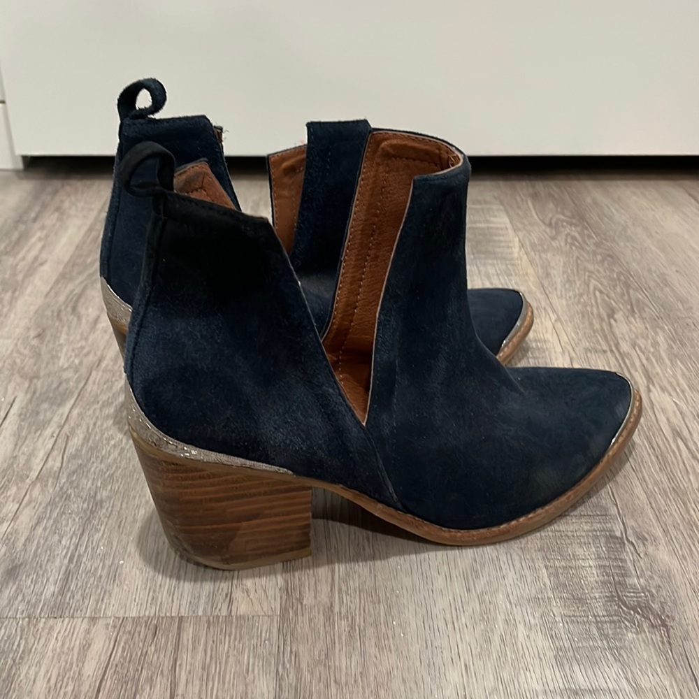Jeffrey Campbell navy suede booties.